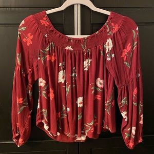 Beautiful burgundy off the shoulder top with flowers from Hollister sized xs.